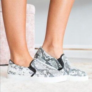 Black and white snakeskin textured slip on sneaker